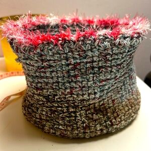 A beautifully handcrafted knit flower pot cover